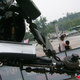 Illustration for article titled VW Passat-a-Bot Transformer Attacks Beijing Mall